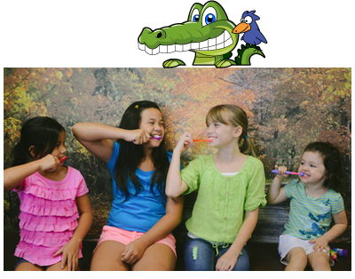 Girls brushing teeth together